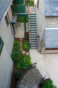 Barrier island home birdseye view of backyard patio staircases