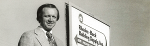 historic portrait of rhodes-buck building supply
