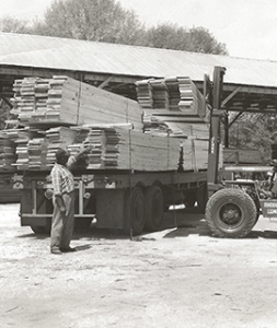 historic lumber loading on a truck